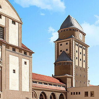 Gaswerk Gelände an einem Sommertag mit Besuchern. Weiterverlinkung auf Gaswerk Vision Seite.