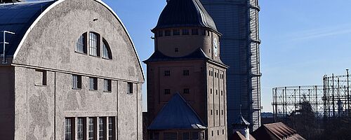 Außenansicht der Gebäude auf dem Gaswerksgelände. Weiterverlinkung auf History Art and Sound im Gaswerk Newsartikel
